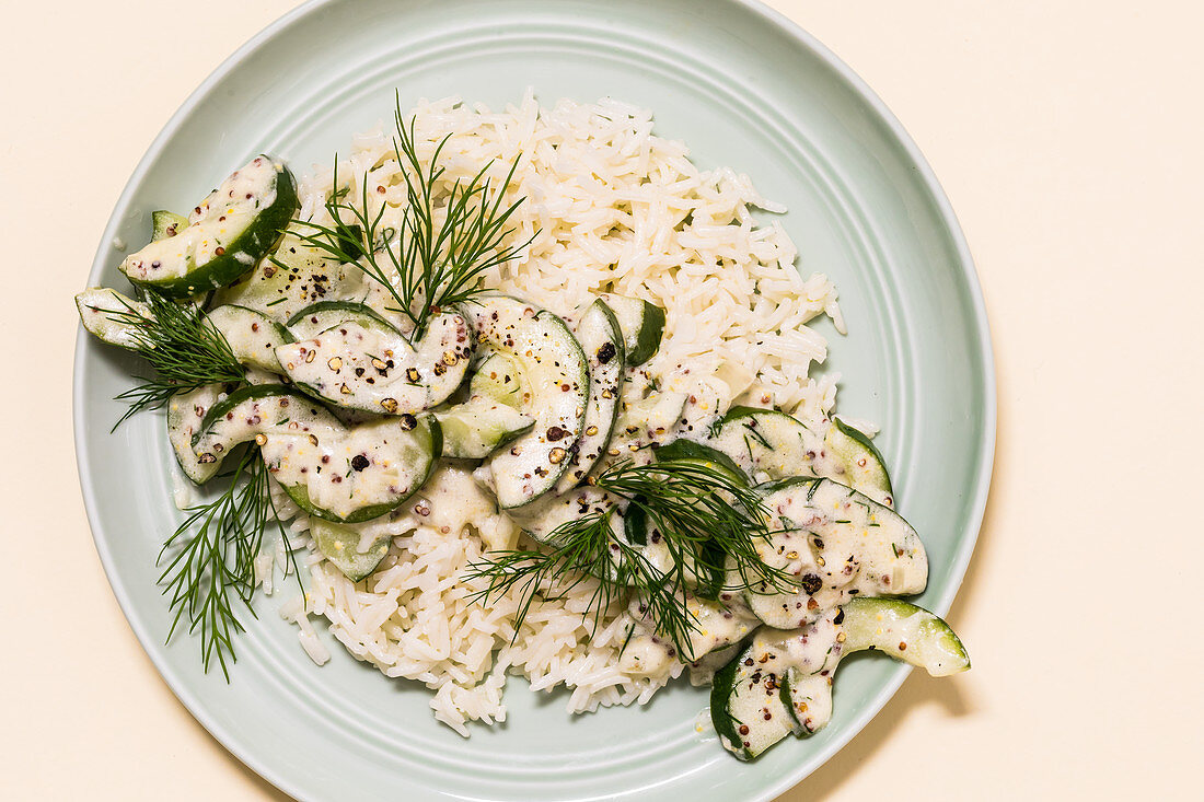 Pickled cucumbers in a dill and mustard sauce with rice