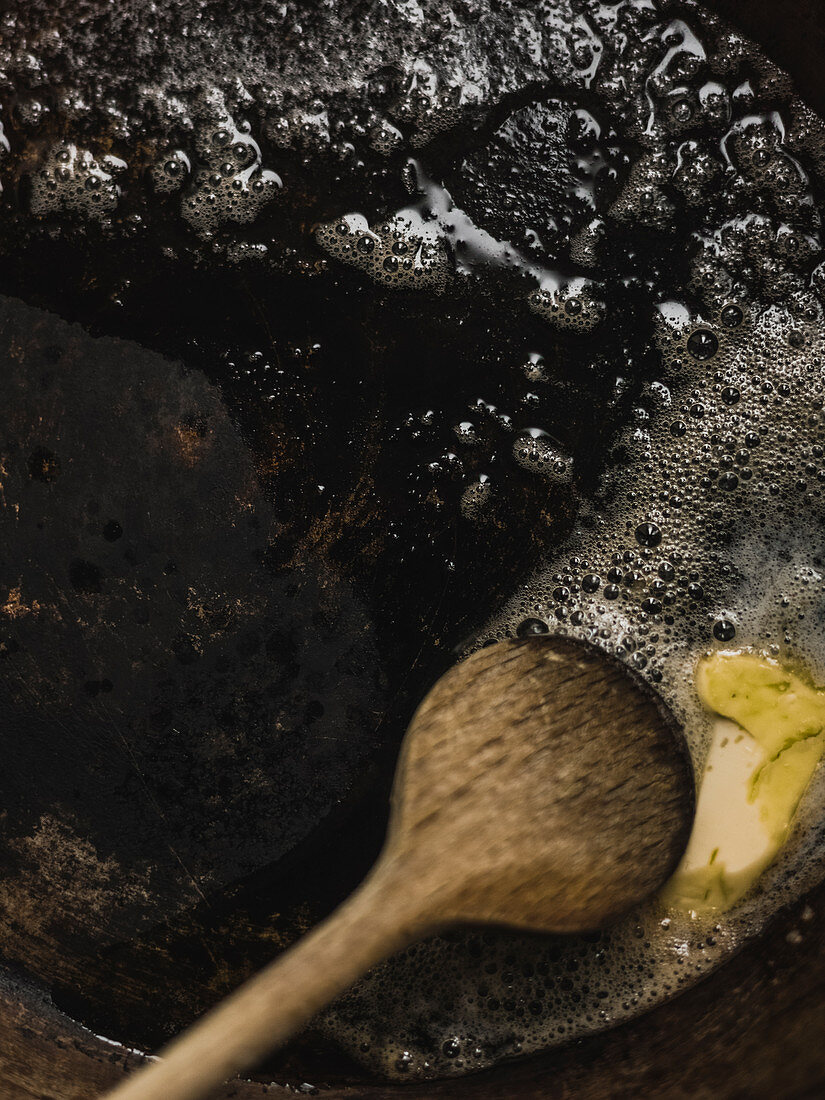 Butter being melted in a pan