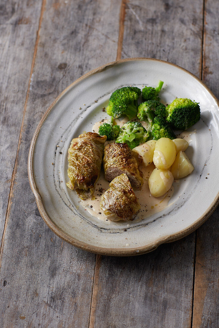 Cabbage roulade with broccoli and potatoes