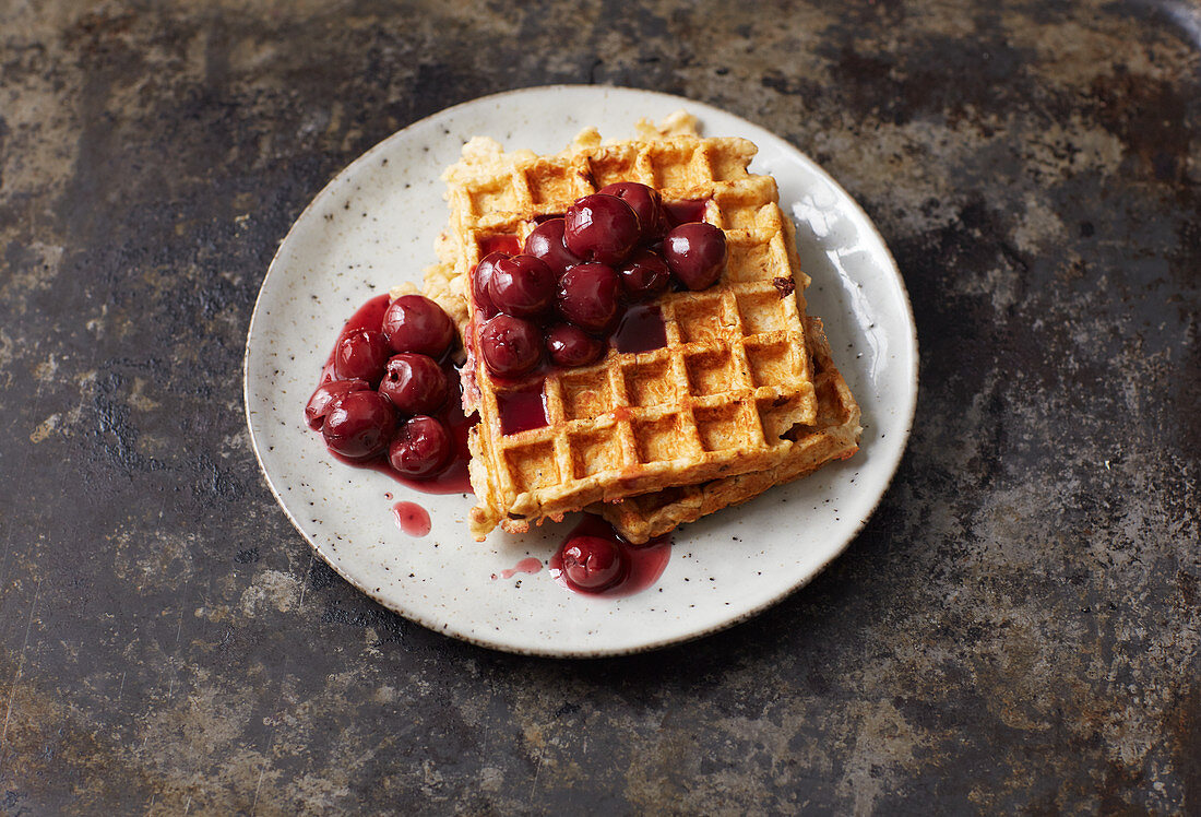 Oat waffles with cherry compote