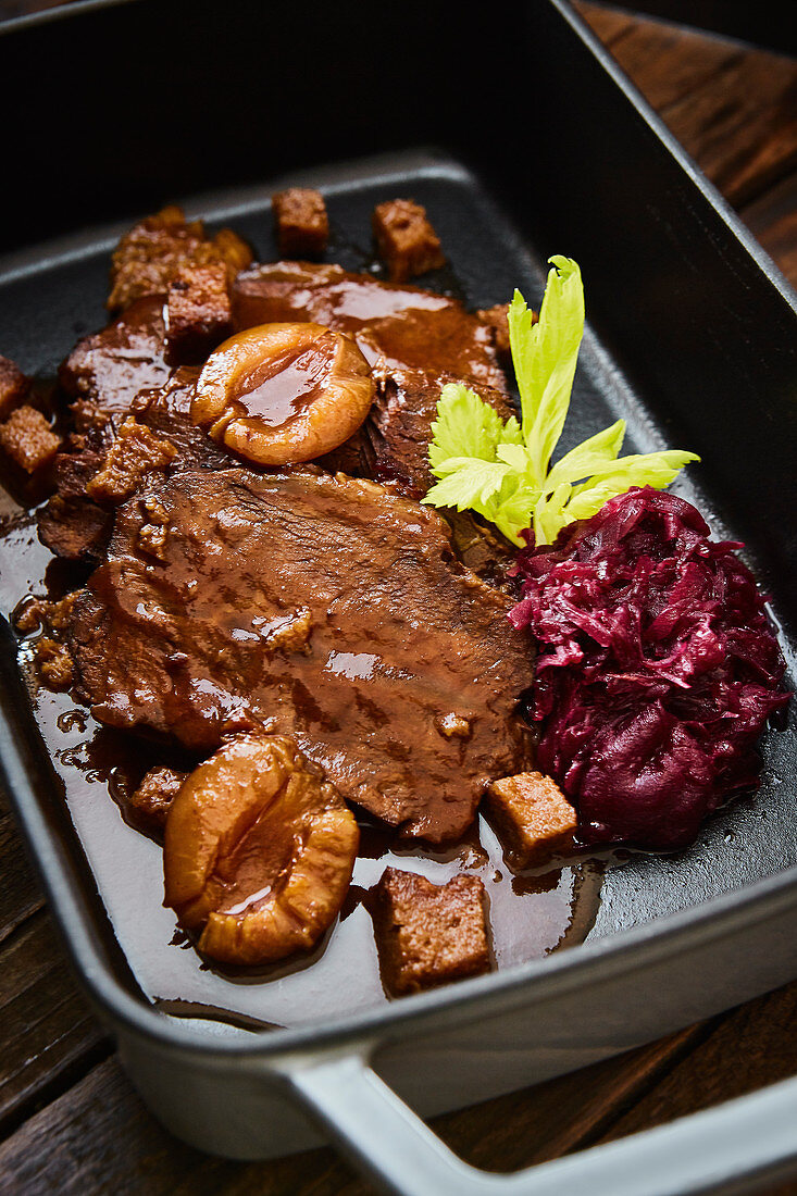 Lower Bavarian Sauerbraten (marinated pot roast) with pickled damsons and red cabbage