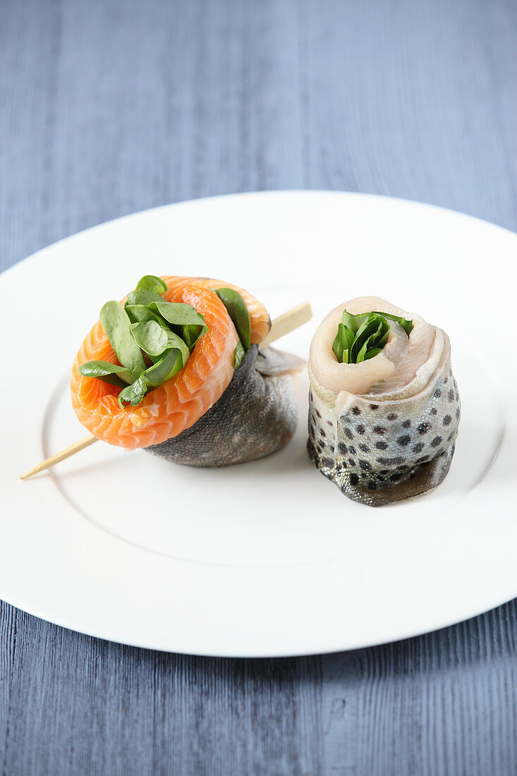 Trout rollmops with spinach leaves