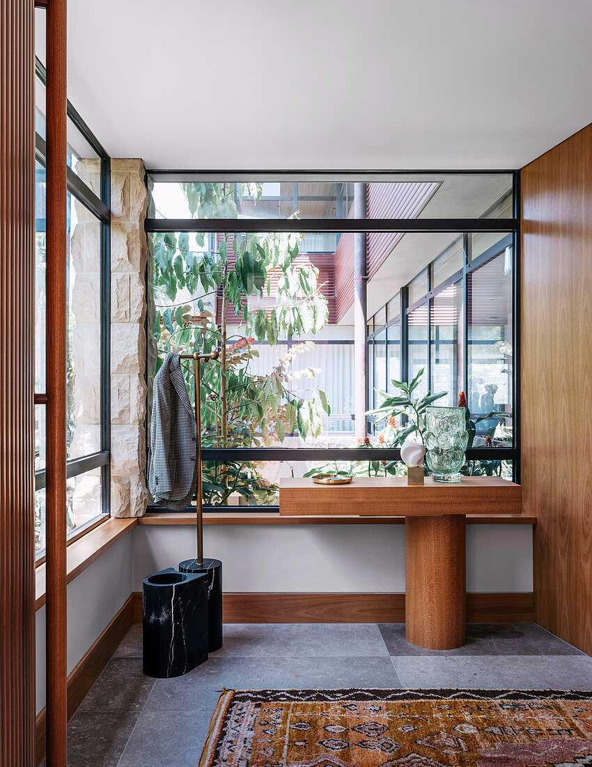 Modern entrance area with glazed windscreen