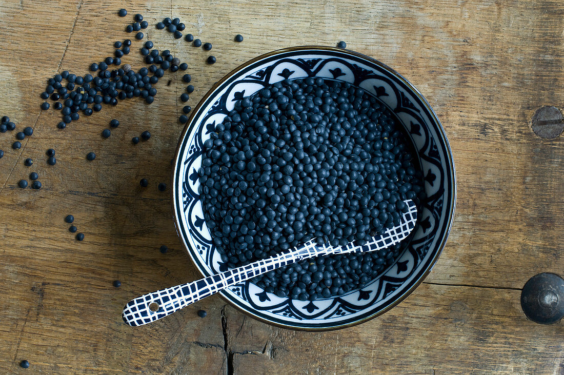 Belgua lentils in a bowl with a spoon