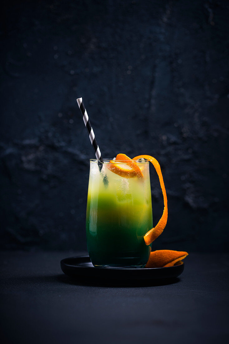 A Green Meadow cocktail (Blue Curaçao and orange juice)