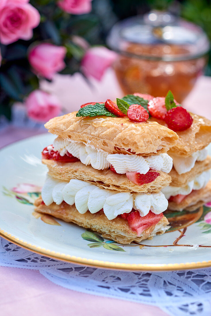 A mille feuille with cream and strawberries