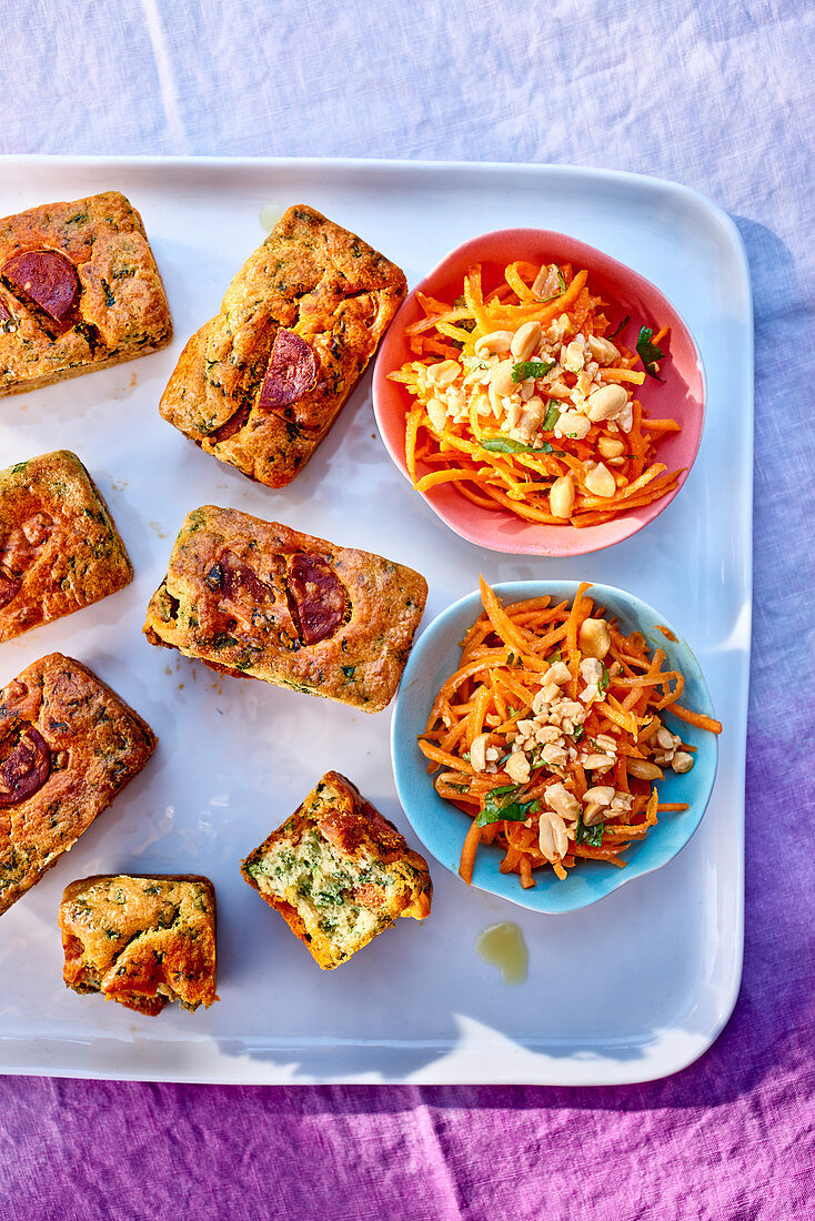 Spicy mini chorizo and spinach cakes and carrot salad with peanuts