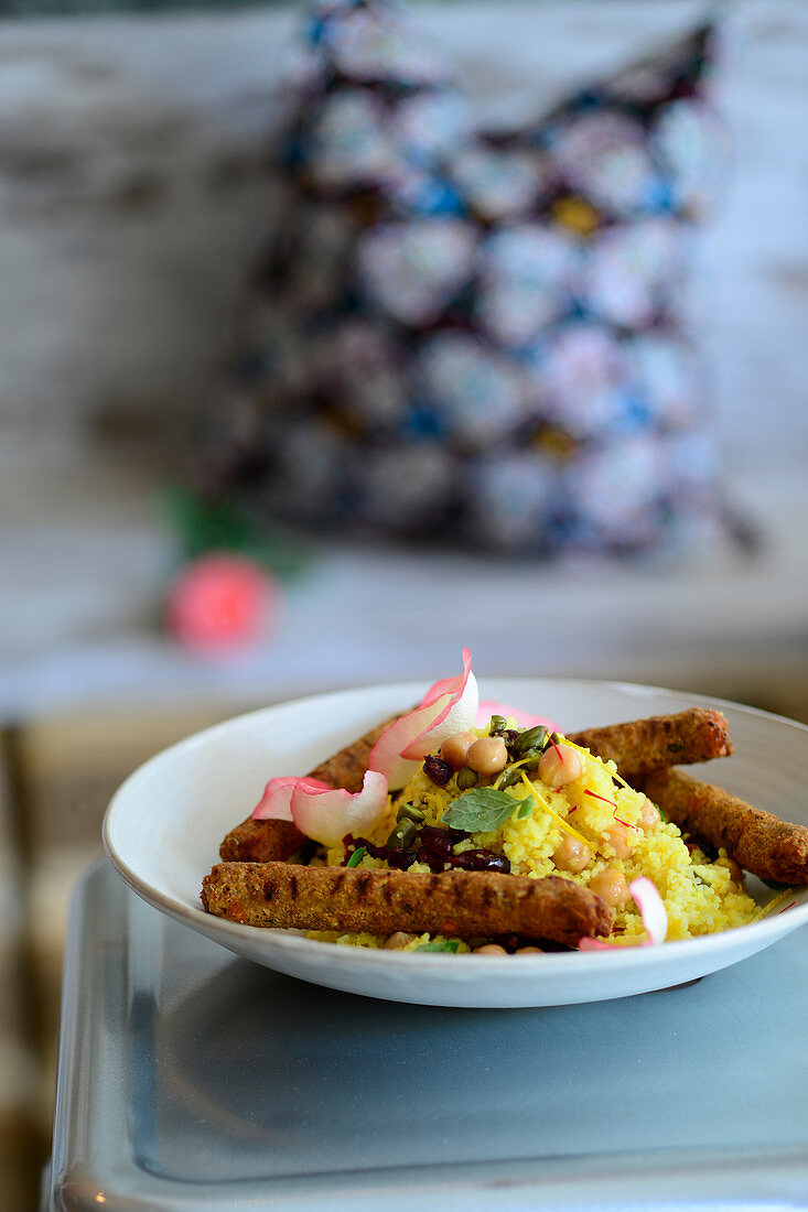 Vegan sausage with a seven gems bulgur salad