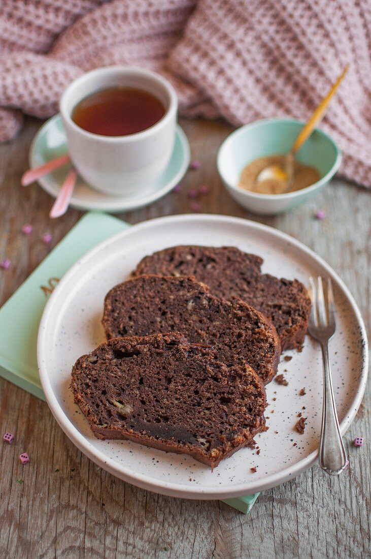 Chocolate banana bread served with cup of tea