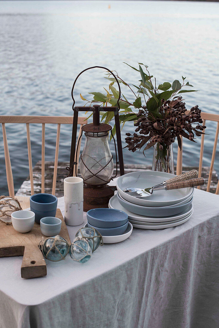 Maritime table on a jetty on a lake