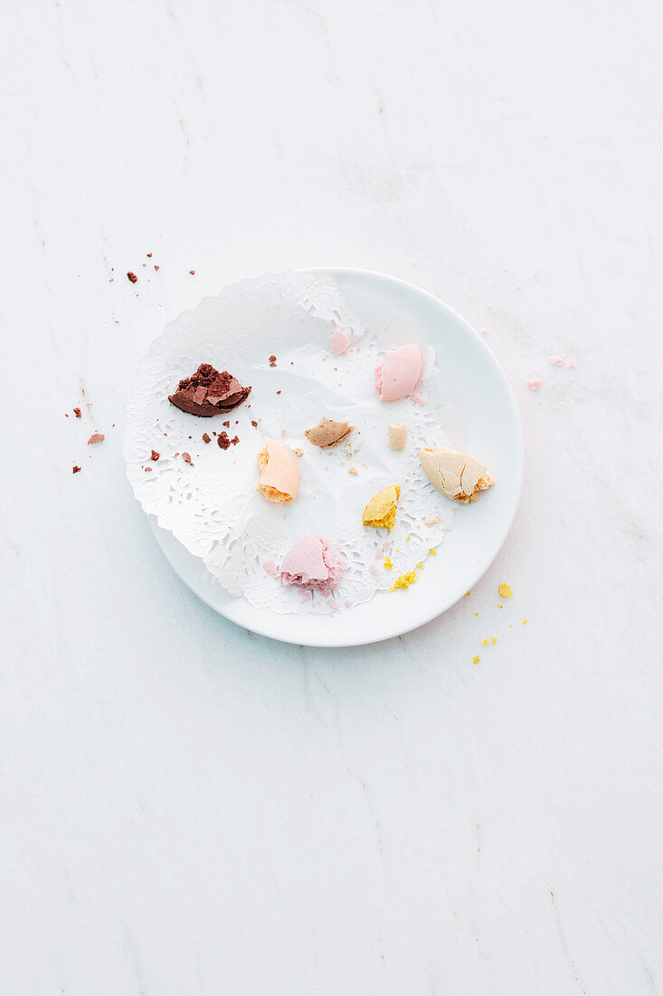 The remains of macaroons on a plate