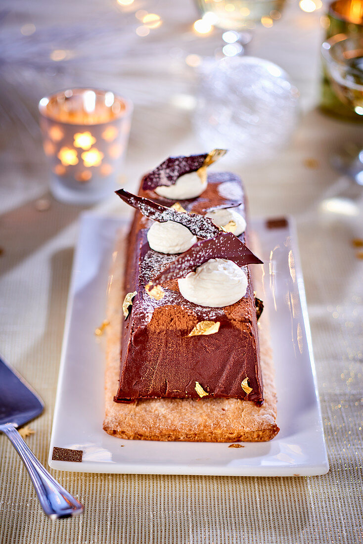 Chocolate terrine on puff pastry for Christmas