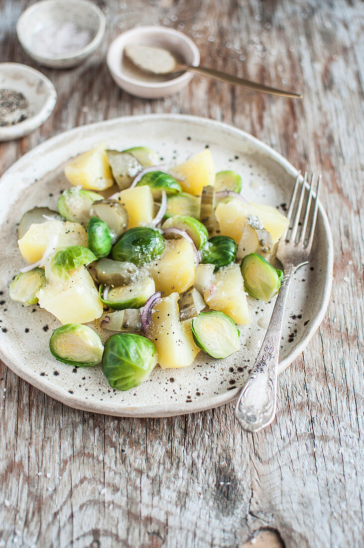 Potato salad with brussels sprout and fermented cucumber