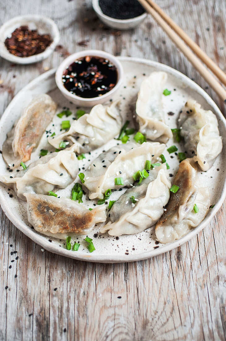 Vegan gyoza dumplings filled with mushrooms, tofu and veggies