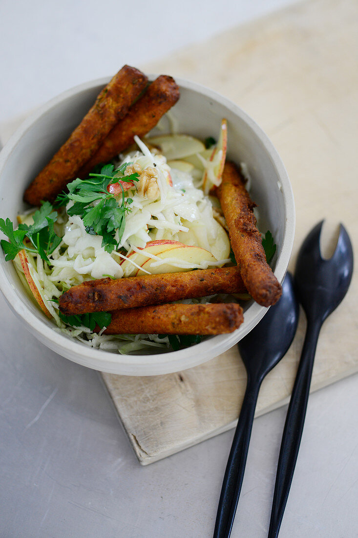 Veggie sausages with apple and elderflower coleslaw