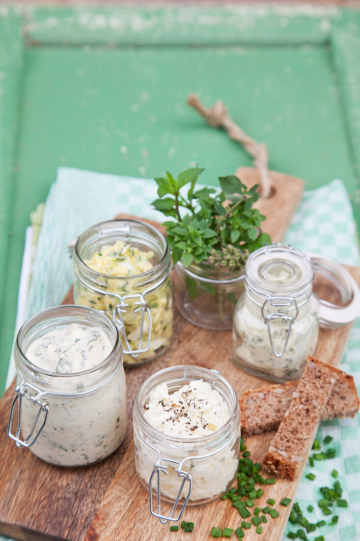 Herbal cream cheese, zucchini spread, potato spread, and wild herbs