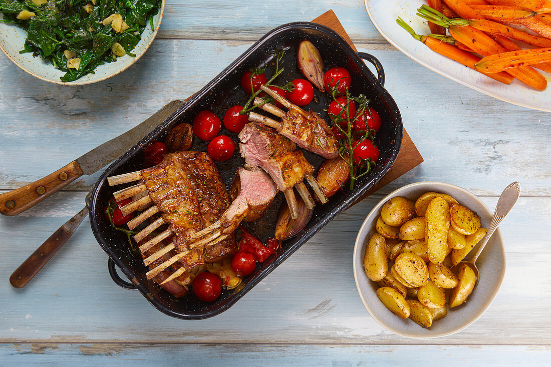 Rack of lamb with cherry tomatoes and fried potatoes