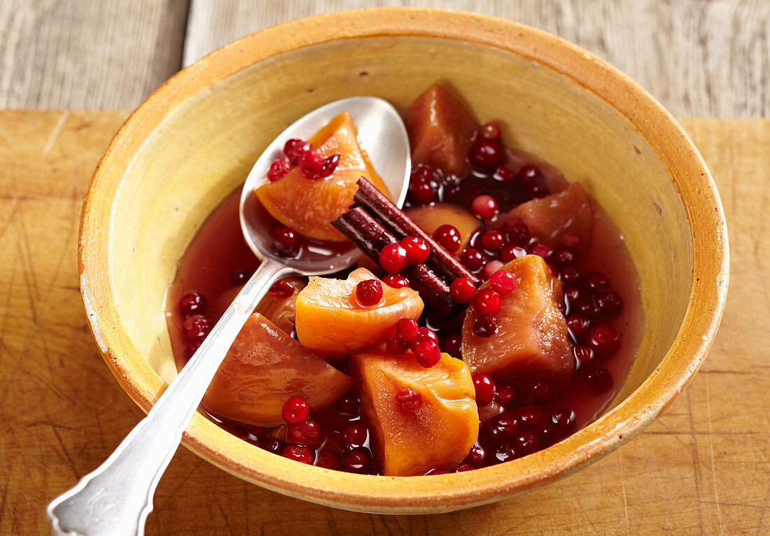 Peach compote with lingon berries and cinnamon