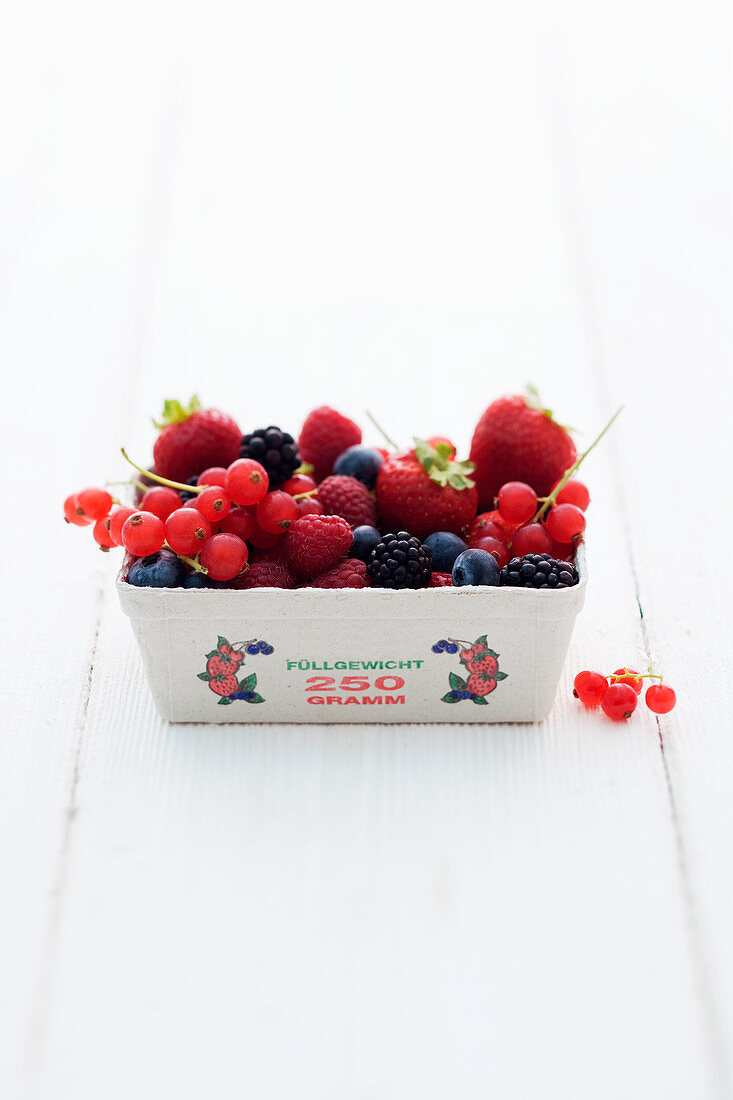 Fresh berries in a cardboard punnet