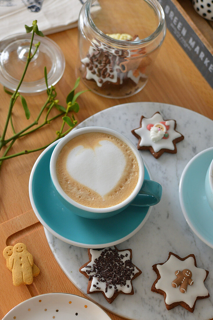 Cup of coffee and gingerbreads
