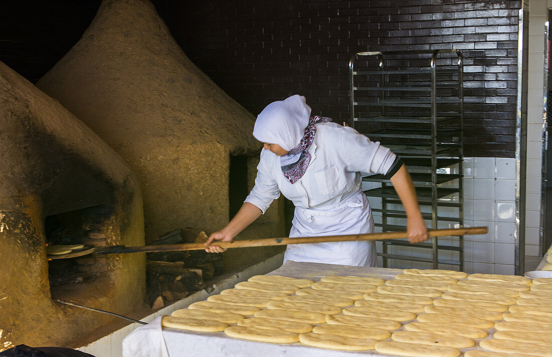 Moroccan Woman Baking Bread
