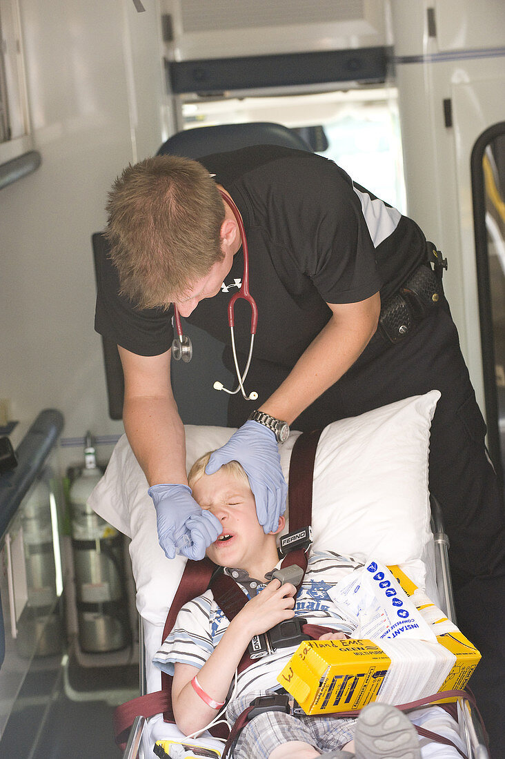 Paramedic Administering Fentanyl to Boy