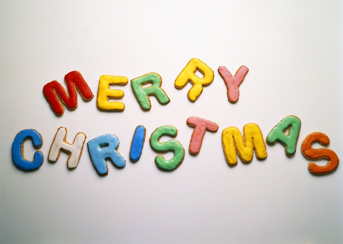 Colourful pastry letters spelling Merry Christmas