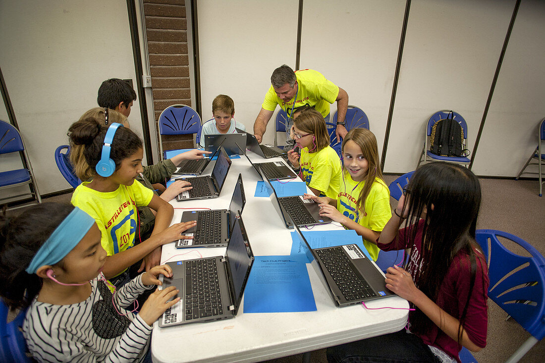Elementary Students Using Laptops