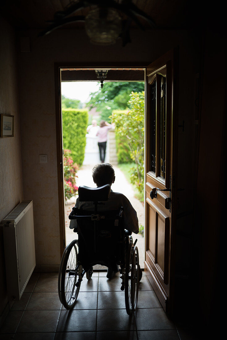 Elderly person in a wheelchair
