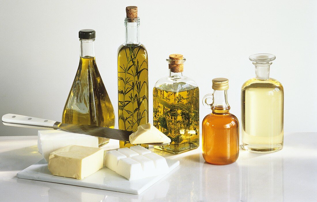 Assorted Fats and Assorted Oils in Bottles
