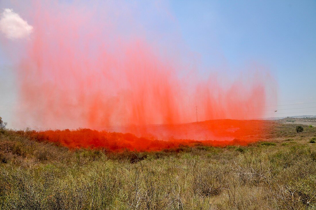 Aircraft dropping fire retardant on a wildfire, Israel