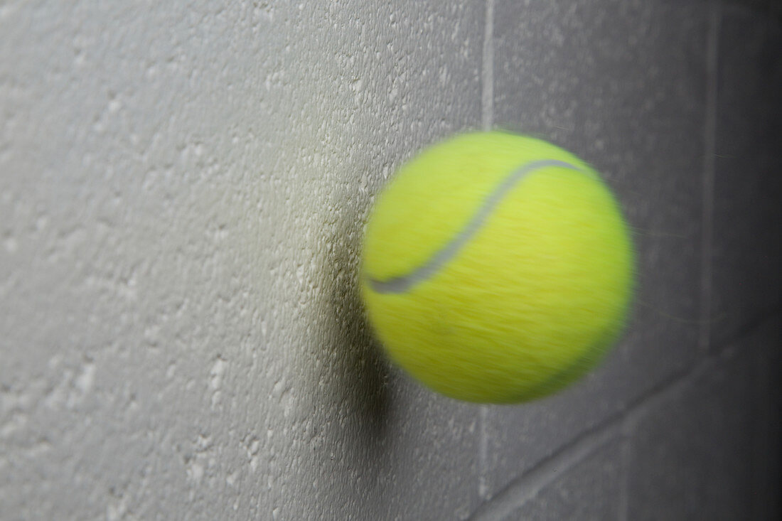 Tennis Ball About to Collide with a Wall