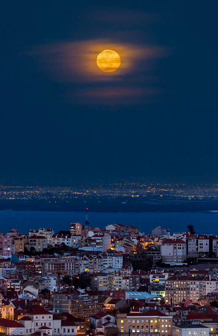 Blue Moon rising over Lisbon