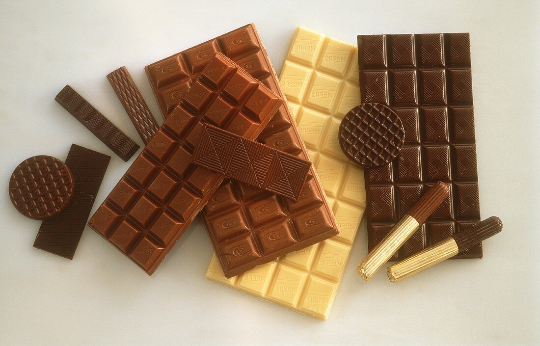 Schokolade: Verschiedene Tafeln, Stücke, Taler & Stäbchen
