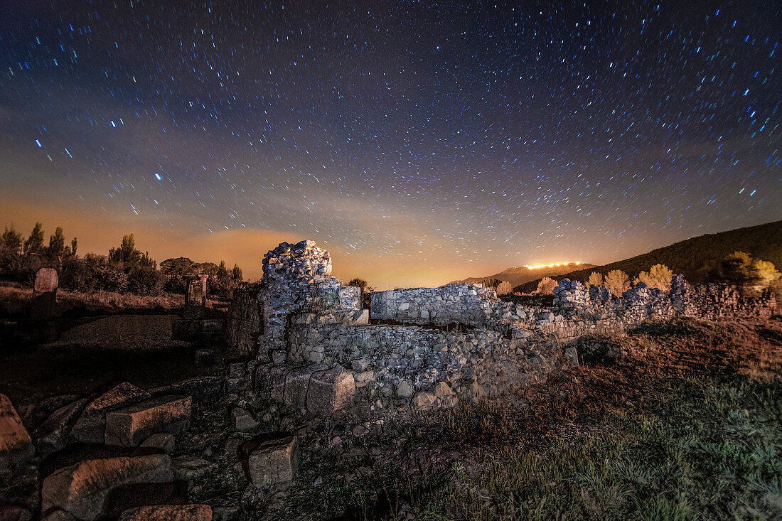 Night sky over Roman ruins