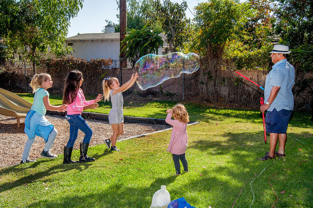 Children play with Giant Bubble