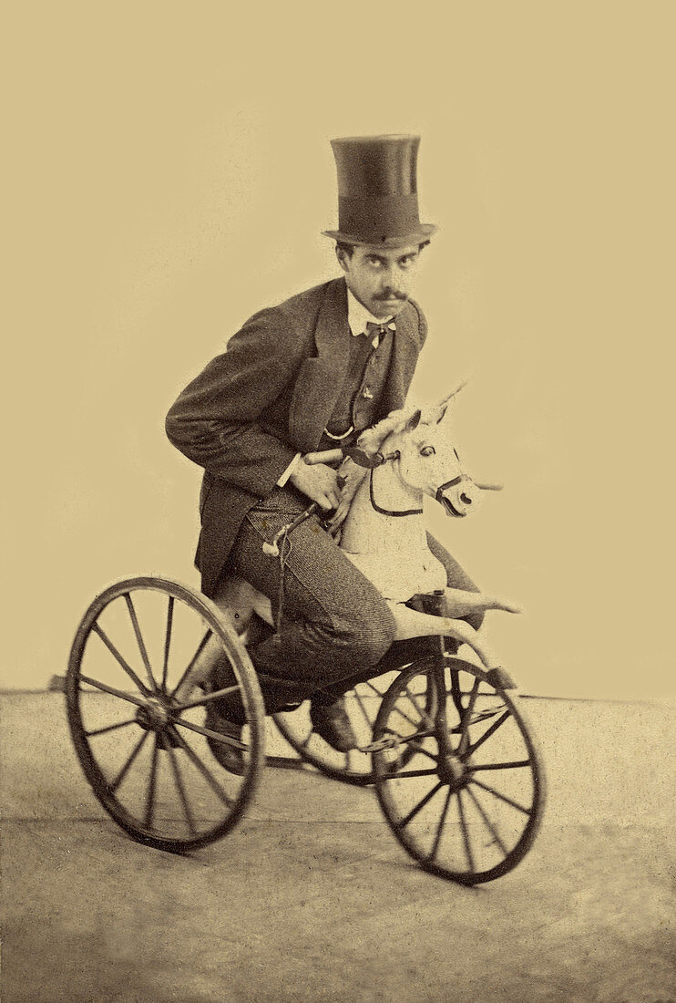 Moustachioed Man Riding Horse-Tricycle, 1865