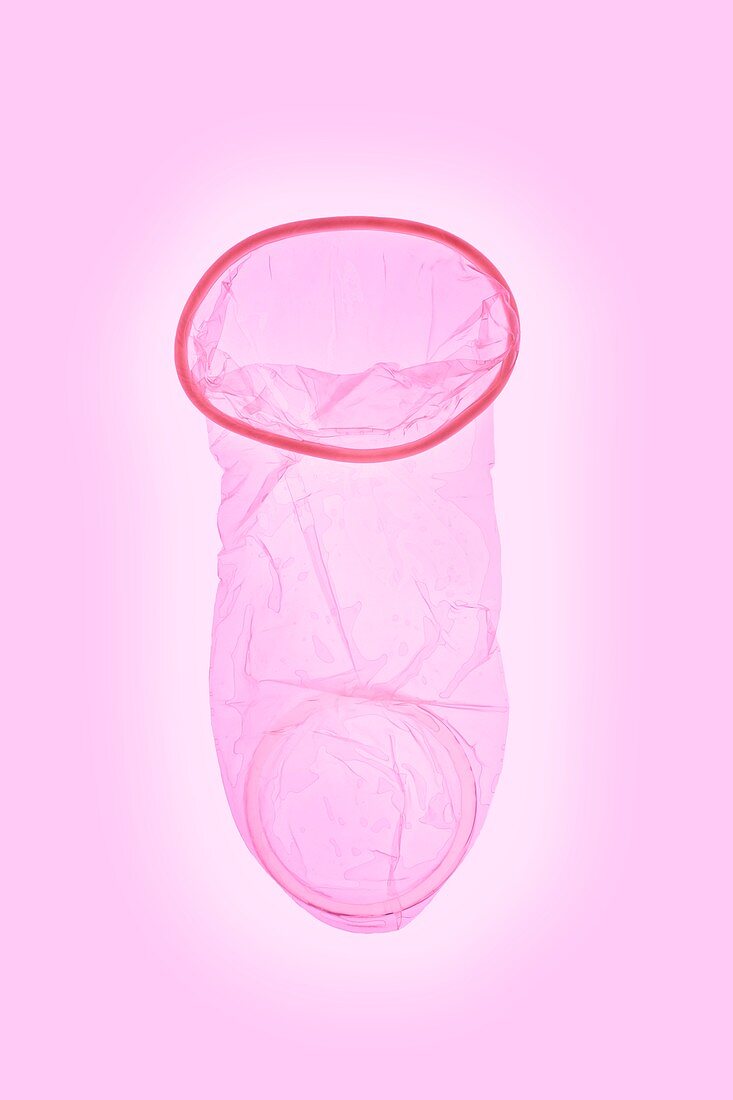Pink female condom