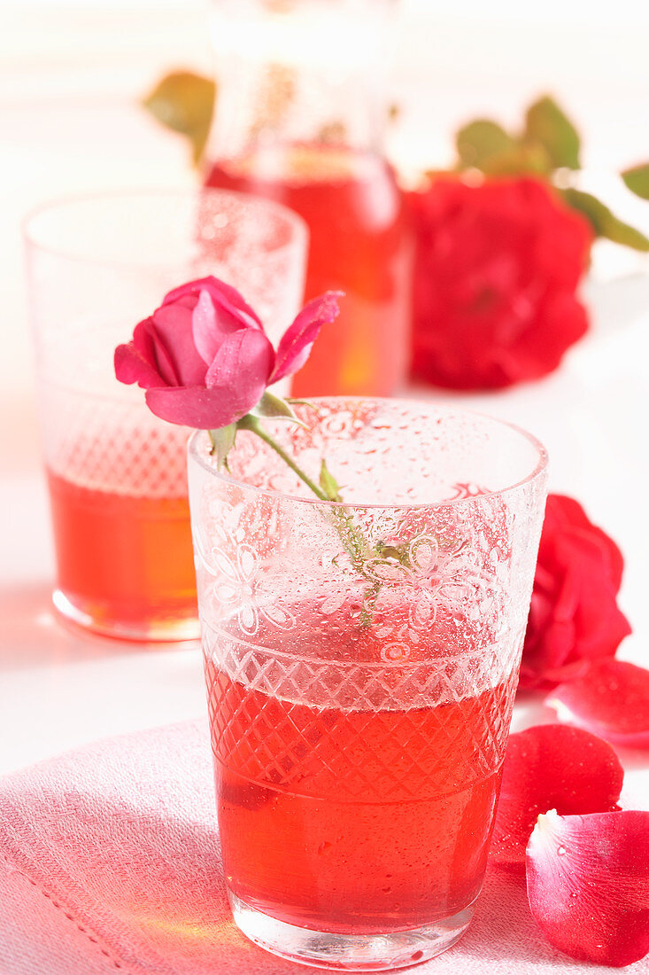 A glass of homemade rose petal syrup