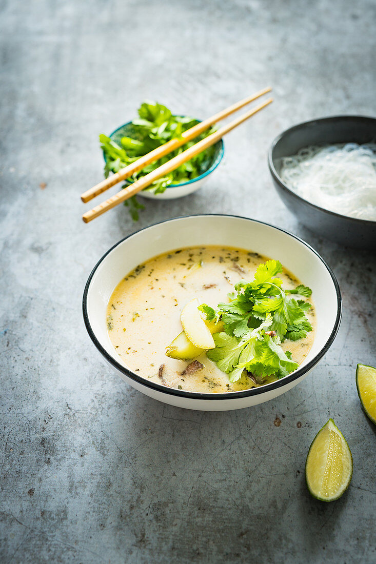 Thai tom kha soup with courgette and mushroom
