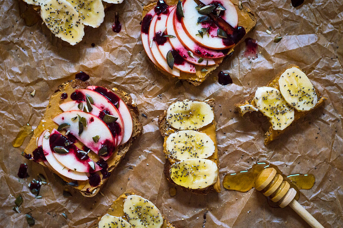 Peanut butter toast with fruit and honey