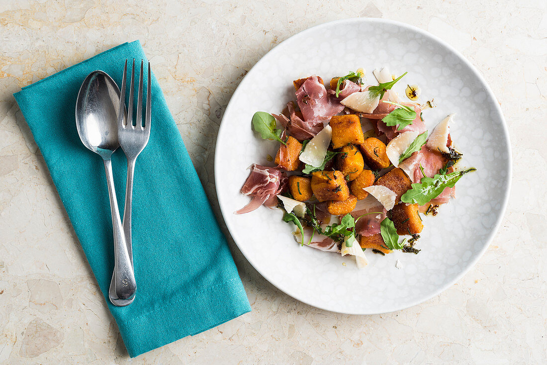 Fried mushrooms with Parma ham and Parmesan cheese