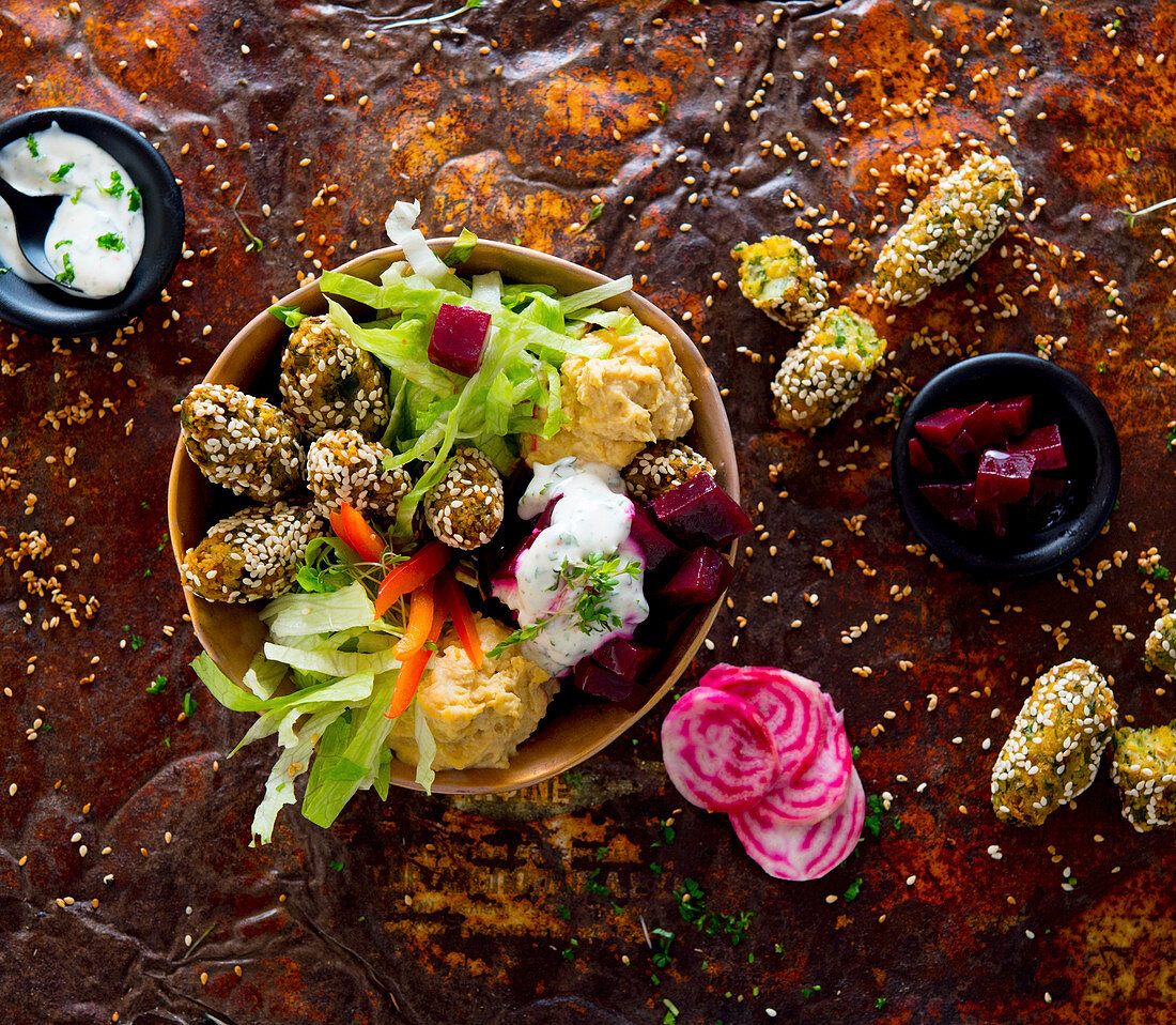 Falafel bowl with hummus and lettuce