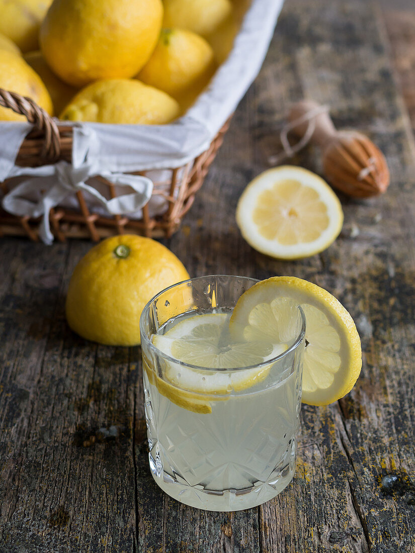 Glass with delicious fresh lemon drink