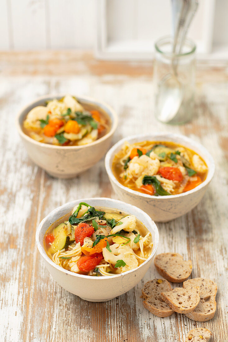 Minestrone with cauliflower, cherry tomatoes and pasta