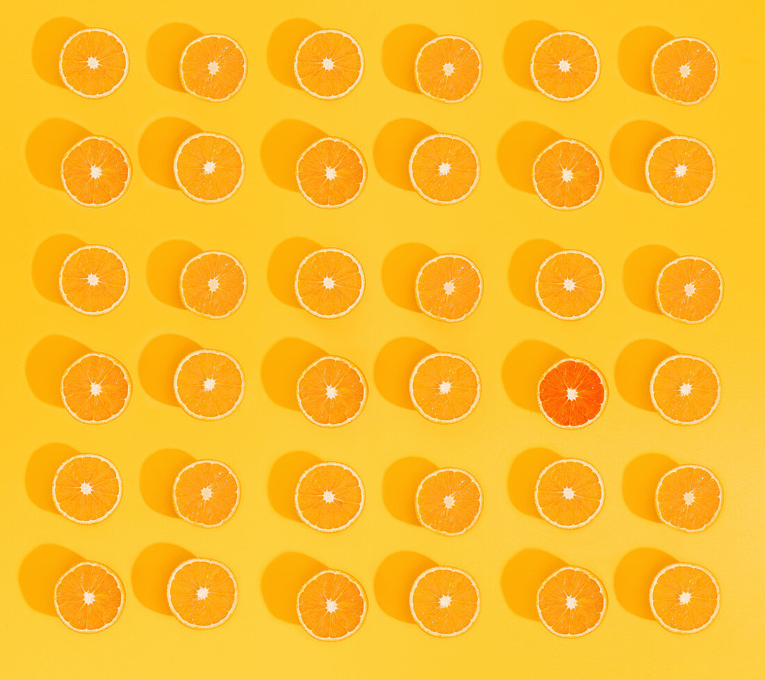 Set of beautiful wallpaper with sliced oranges on bright yellow background