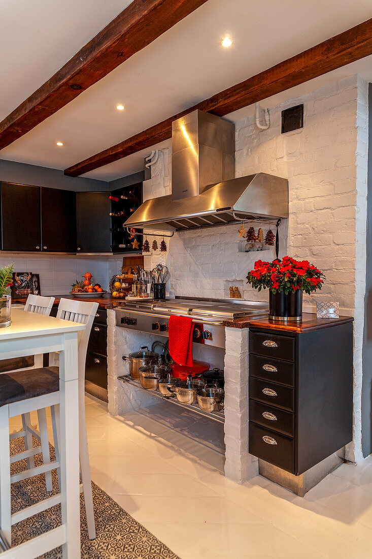 Gas cooker in modern black-and-white country-house kitchen