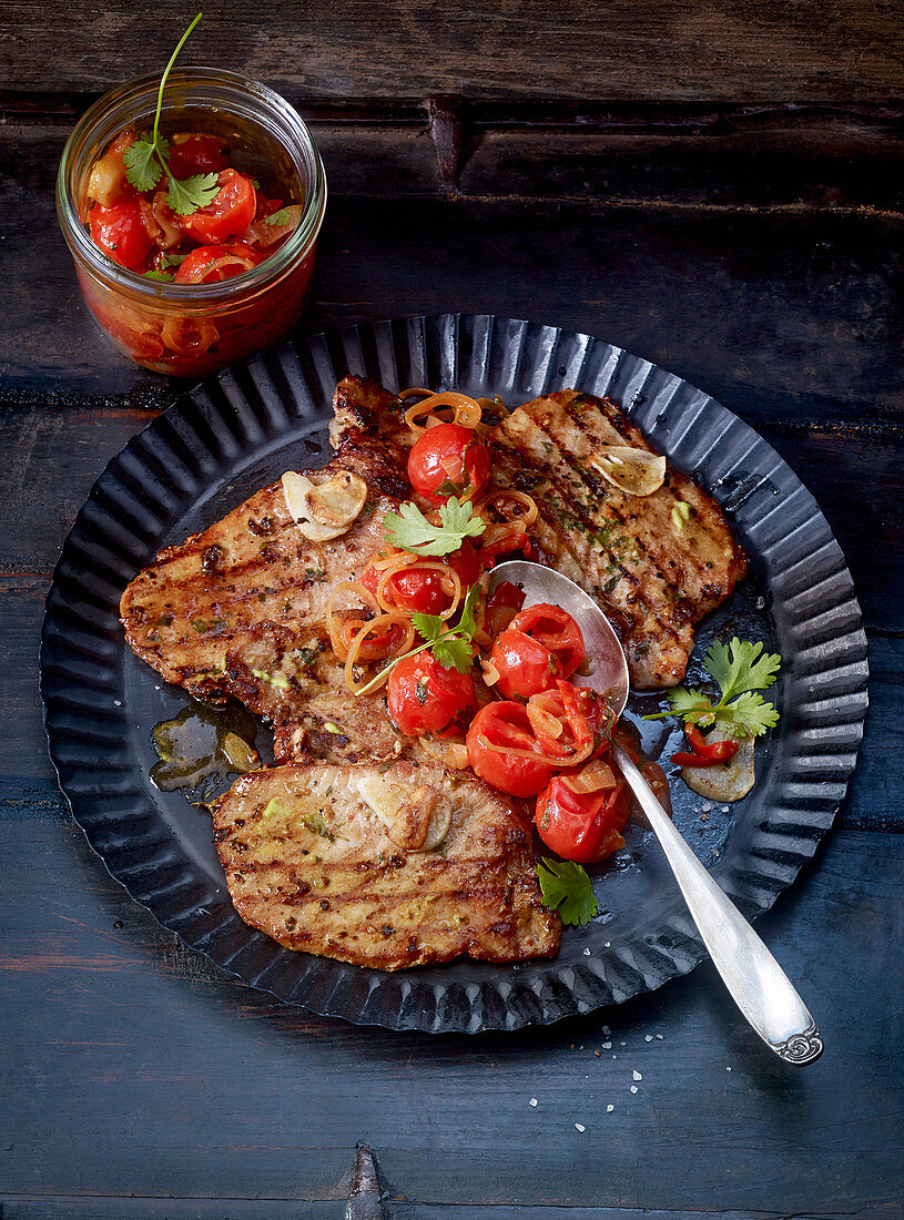 Minute steaks with preserved tomatoes