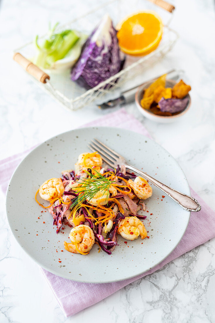 Red cabbage and fennel coleslaw with spicy-fruity prawns