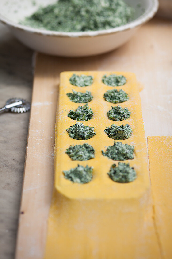 Spinach and ricotta ravioli being made